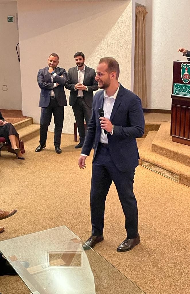 Mohammad facilitating a session with a microphone